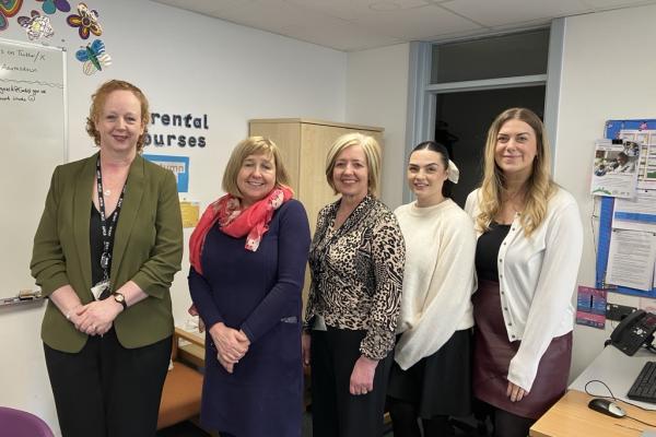 Photo - from left to right; Emma Thomas, Head Teacher Adamsdown Primary School, Lynne Neagle, Cabinet Secretary for Education, Tracey Gallagher, Family Engagement Officer, Sophie Moignard, Community Focused Schools Cluster Manager, Cardiff Local Authority and Emily Parker, Local Authority Community Focused Schools Officer.